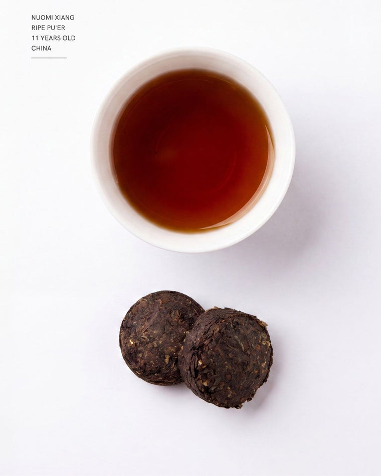 Nuo Mi Xiang Pu'erh — 11 yrs